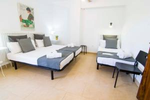Posteľ alebo postele v izbe v ubytovaní Letmalaga Economy Compas
