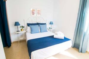 Postel nebo postele na pokoji v ubytování Letmalaga Economy Compas
