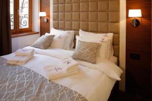 Postel nebo postele na pokoji v ubytování Hotel Passpartù Home Garni