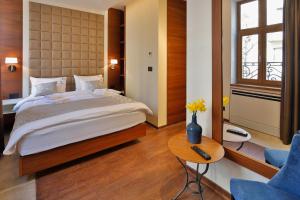 Postel nebo postele na pokoji v ubytování Hotel Passpartù Home Garni