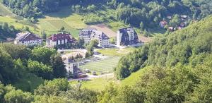 an aerial view of a resort in a mountain at ApartHotel Kopaonik in Brzeće