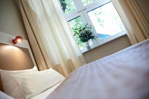 Voodi või voodid majutusasutuse Hotel Domicil Hamburg by Golden Tulip toas