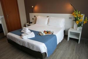 Postel nebo postele na pokoji v ubytování Park Hotel