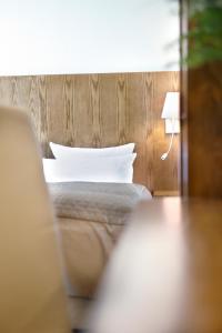 Voodi või voodid majutusasutuse Hotel Domicil Hamburg by Golden Tulip toas