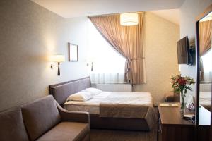 Postel nebo postele na pokoji v ubytování Panska Gora