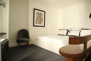 Ein Bett oder Betten in einem Zimmer der Unterkunft Bail mobilité appartement Louvre Palais Royal
