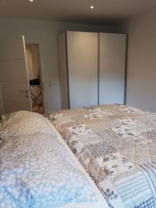 Un pat sau paturi într-o cameră la Ausseeerland