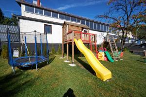 a group of playground equipment in a yard at Villa Panorama in Sarajevo