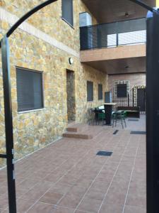 Балкон или терраса в Apartamentos "Casa Rural de Aldea"