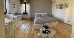 A bed or beds in a room at Al bosco incantato