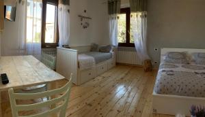 A bed or beds in a room at Al bosco incantato