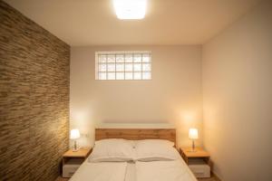 Postel nebo postele na pokoji v ubytování Zsálya Vendégház