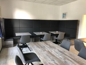 a conference room with tables and chairs in it at Casino Hotel Hamm in Hamm