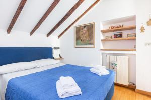Posteľ alebo postele v izbe v ubytovaní Piazza Risorgimento Cosy Studio