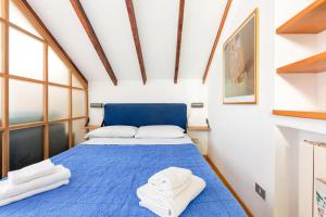 Posteľ alebo postele v izbe v ubytovaní Piazza Risorgimento Cosy Studio
