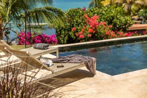 Kolam renang di atau dekat dengan Villa Cerisier piscine et vue imprenable sur la mer