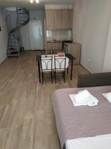 A kitchen or kitchenette at Lighthouse Apartments Még 37 kép