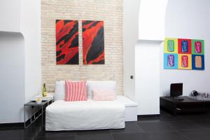 A bed or beds in a room at L’ARTSHOP