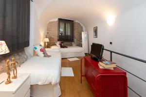 A bed or beds in a room at L’ARTSHOP