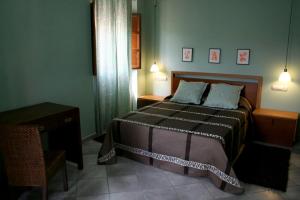 Postel nebo postele na pokoji v ubytování Hostal Mesón Castilla