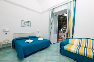 Postel nebo postele na pokoji v ubytování Hotel Floridiana Terme