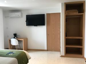 TV o dispositivi per l'intrattenimento presso Hotel Ros Gaud