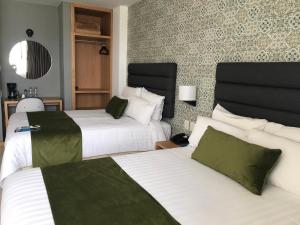 Letto o letti in una camera di Hotel Ros Gaud