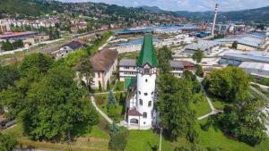 an aerial view of a building with a green roof at Apartmani GS ***** Zavidovici in Zavidovići