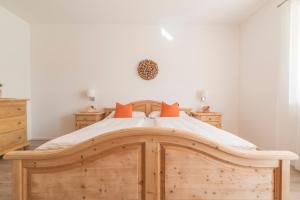 A bed or beds in a room at Ferienwohnung Eder