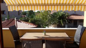 Ein Balkon oder eine Terrasse in der Unterkunft Oliva Holiday Apartment