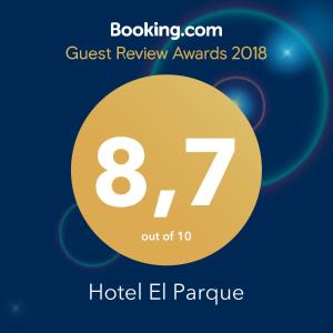 a sign that reads guest review awards with a yellow circle at Hotel El Parque in San Clemente del Tuyú
