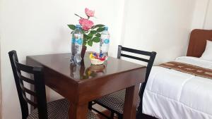 Postel nebo postele na pokoji v ubytování Hostal Comarca Imperial