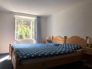 Postel nebo postele na pokoji v ubytování Ristorante Albergo All'acqua