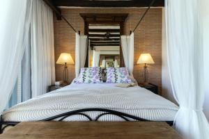 Apartamento Playa Centro Vistas Mar客房内的一张或多张床位