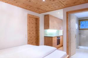 Postel nebo postele na pokoji v ubytování Chalet Waldhaus Rappakopf