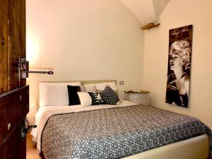 Кровать или кровати в номере Casa Vannucci
