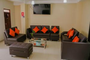 Χώρος καθιστικού στο RUMIQOLQA Machupicchu Hotel
