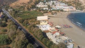 an aerial view of a beach and buildings at Orange Fodele in Fodele