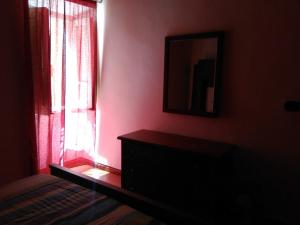 Postel nebo postele na pokoji v ubytování Ca Rosella + 1 fotografie