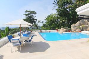 Πισίνα στο ή κοντά στο Hermosa villa con 5 habitaciones en el exclusivo fraccionamiento las brisas Acapulco