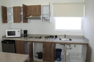 Kuchyň nebo kuchyňský kout v ubytování Suites Chapultepec