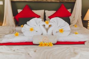 Postelja oz. postelje v sobi nastanitve Maylie Bali Villa