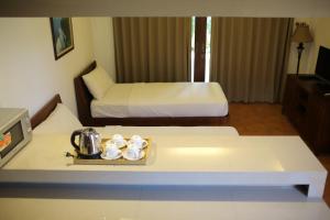 Postel nebo postele na pokoji v ubytování Vidi Boutique Hotel