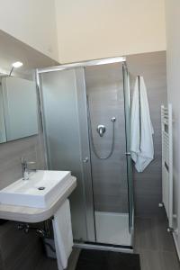 a bathroom with a sink and a shower at il leccio in San Lazzaro di Savena