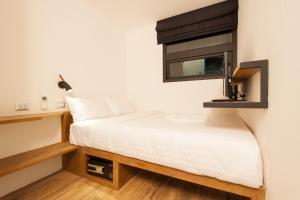 Postel nebo postele na pokoji v ubytování Indie Hostel - Koh Tao