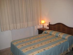 Postel nebo postele na pokoji v ubytování Hostal Los Andes