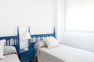 Posteľ alebo postele v izbe v ubytovaní Beautiful apartment with terrace near the beach
