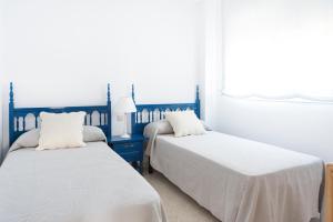 Posteľ alebo postele v izbe v ubytovaní Beautiful apartment with terrace near the beach