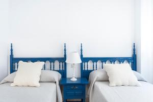 Posteľ alebo postele v izbe v ubytovaní Beautiful apartment with terrace near the beach