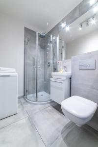 Kúpeľňa v ubytovaní Apartament Sobieskiego 2a Parking gratiss + 17 fotografií